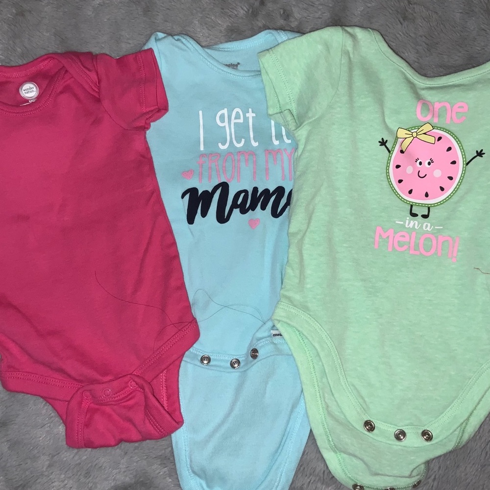 3 baby onesies